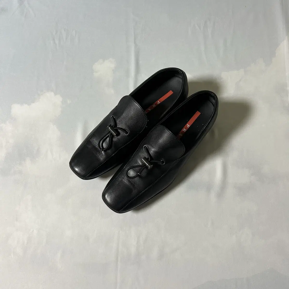 Prada nappa toggle slipon loafers